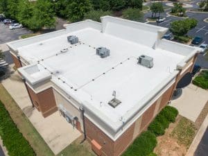 Professional Aerial Drone Image of Commercial Roof Featuring TPO Roof HVAC Equipment Architecture Roofing Industry - Oak Grove Roofing - Oak Grove Roofing